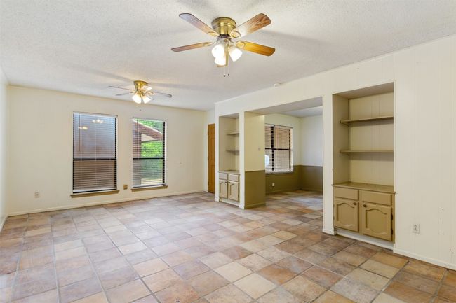 Ceiling fan and freshly grouted tile floors | Image 4
