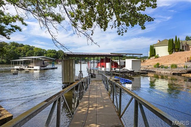 Dock featuring a water view | Image 33