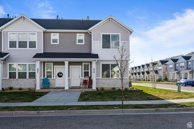 Multi unit property with board and batten siding, a residential view, a front yard, and roof with shingles | Image 26