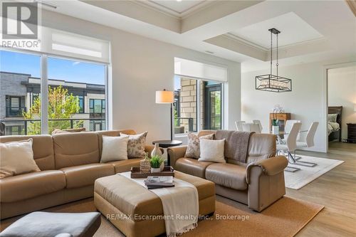 303-123 Maurice Dr, Oakville, ON, L6K2W6 | Card Image