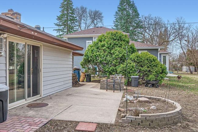 Lovely patio is very spacious. Bring your gardening ideas as this space could be spectacular with some fresh plantings. | Image 23