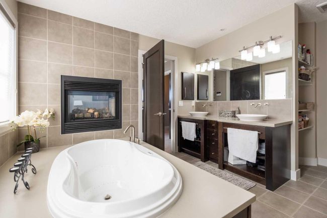 67 Tusslewood View Nw, Home with 4 bedrooms, 3 bathrooms and 4 parking in Calgary AB | Image 24