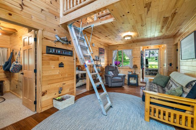 Family room and stairs to loft | Image 17