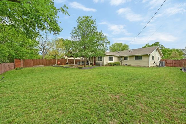 Large fenced-in backyard with room for a pool, ADU, and more. A modern masterpiece you won’t want to miss—schedule your private tour today! | Image 40