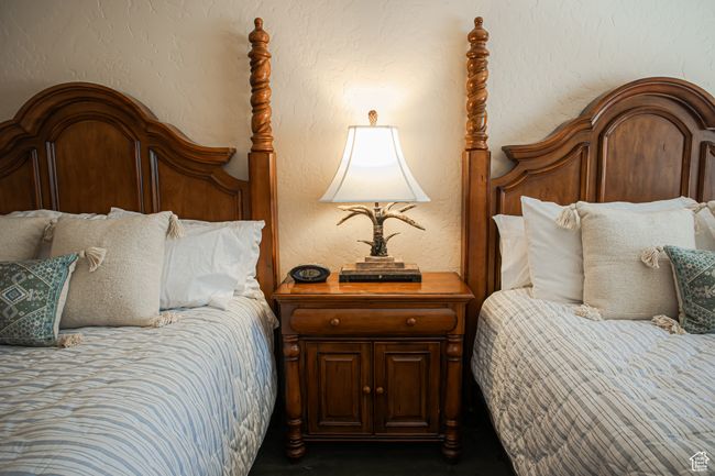 Bedroom featuring a textured wall | Image 24