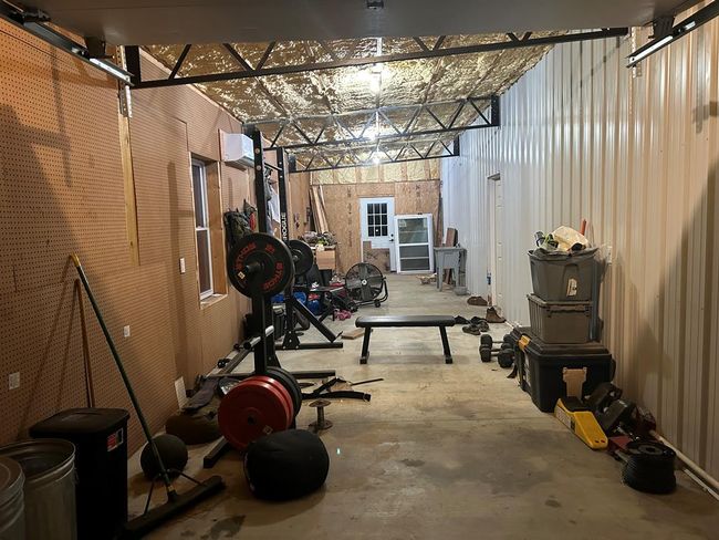 Attached workshop/garage area has mini split HVAC | Image 24