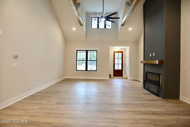 Window filled Living Room adds lots of natural light | Image 9