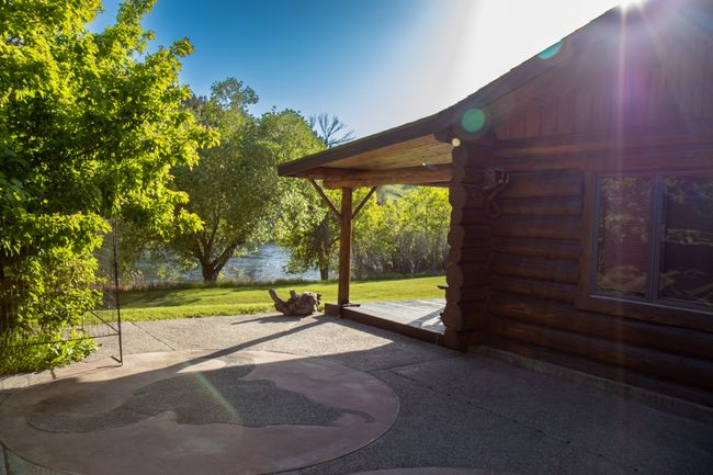 View of patio with a wooden deck | Image 56