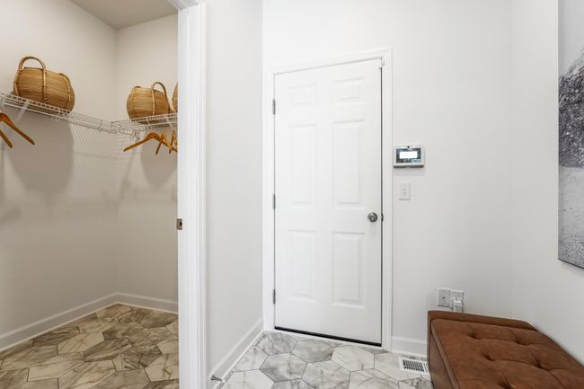 Photo is of the actual model. The mudroom, just off the kitchen. | Image 12