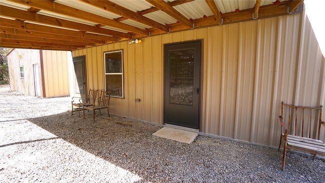 Private entry and covered area located off each bedroom suite | Image 12