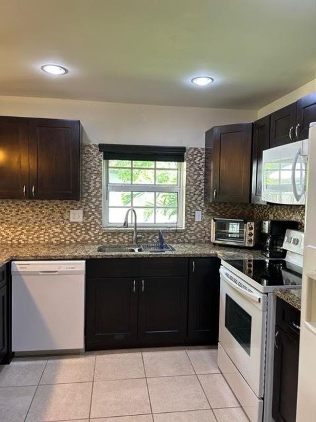 1473 Ne 48 Th St, House other with 3 bedrooms, 2 bathrooms and null parking in Pompano Beach FL | Image 29