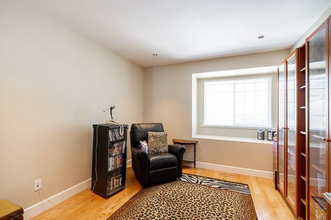 Living area with light wood-type flooring and recessed lighting | Image 24