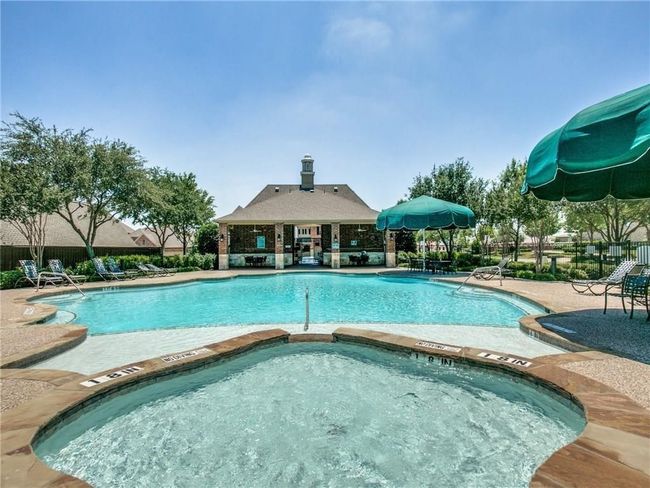 Community pool featuring a community hot tub and a patio area | Image 27