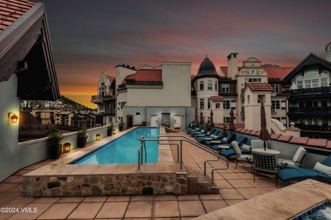Evenings hit different from up here. As the sun sets behind the peaks, Arrabelle’s rooftop pool transforms into a serene alpine escape—reserved for owners and guests. Whether you're winding down after a powder day or soaking under the stars, it's the kind of amenity that keeps visitors coming back—and makes ownership even sweeter. | Image 21