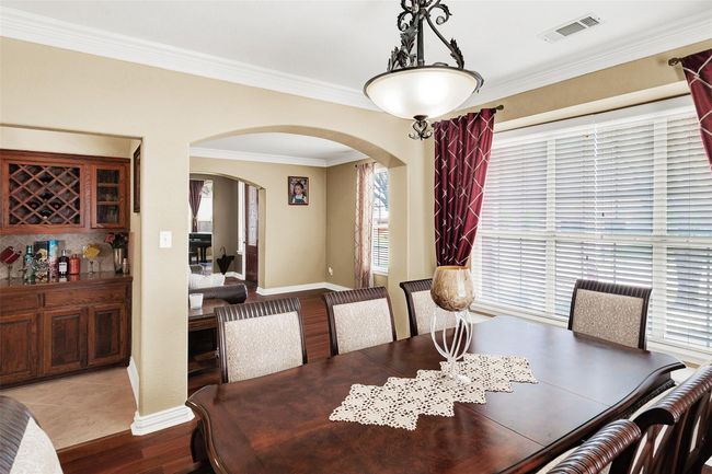 Formal dining with additional serving area | Image 12