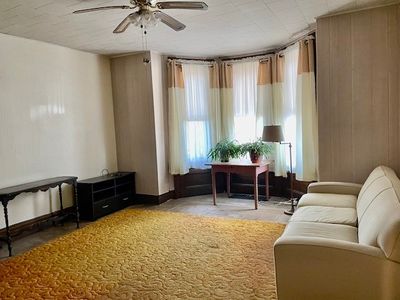 Living room with large bay window. | Image 2