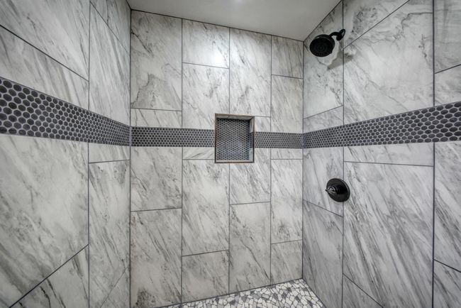 Full bathroom featuring a tile shower | Image 18