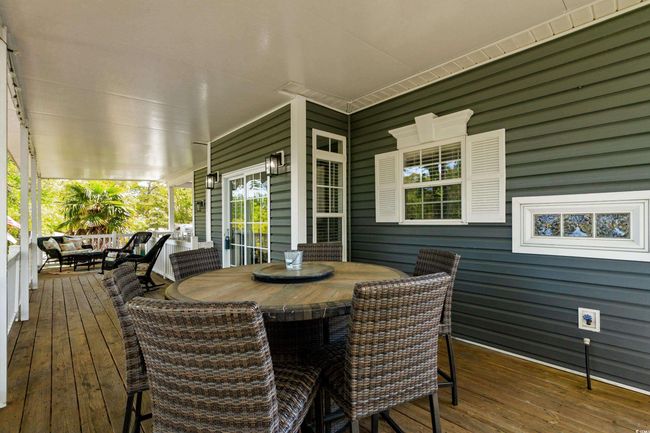 Sunroom / solarium with outdoor dining space | Image 10