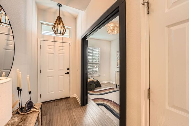 Foyer entrance with baseboards and wood finished floors | Image 7