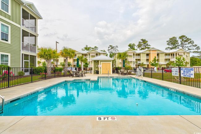 View of property's community featuring a lawn and a water view | Image 37