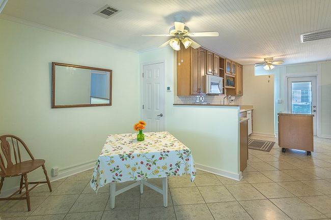 4-5 - 47 E Pine Ave, Home with 3 bedrooms, 2 bathrooms and 2 parking in Lanark Village FL | Image 5