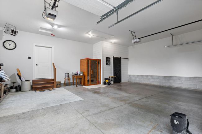 Neat as a pin 3 car heated garage. | Image 10