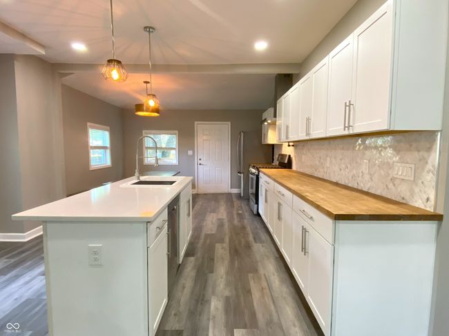 Renovated kitchen with an open concept design | Image 6