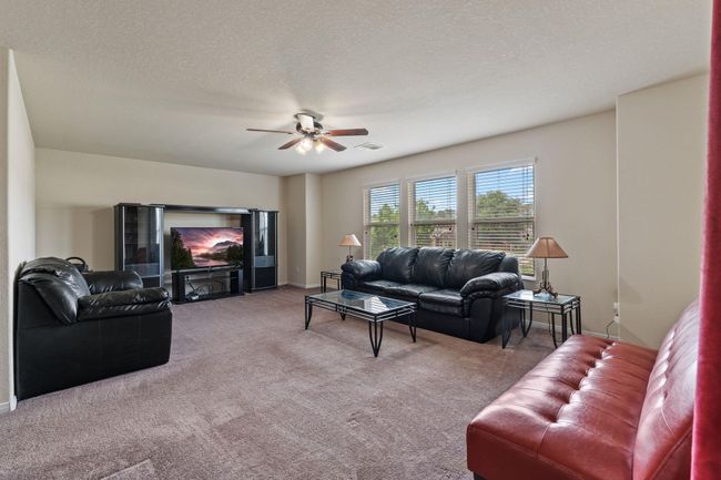 On the back portion of the upstairs is the huge game room that overlooks the back yard. | Image 25