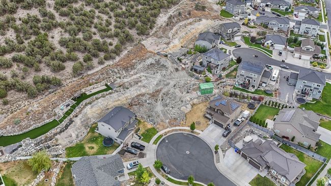 Aerial overview of property's location with nearby suburban area | Image 9