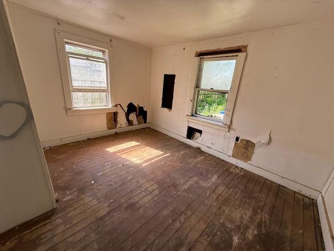 Spare room with wood-type flooring and plenty of natural light | Image 10