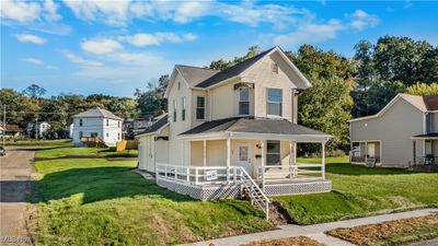 View of front of home with a front lawn | Image 1