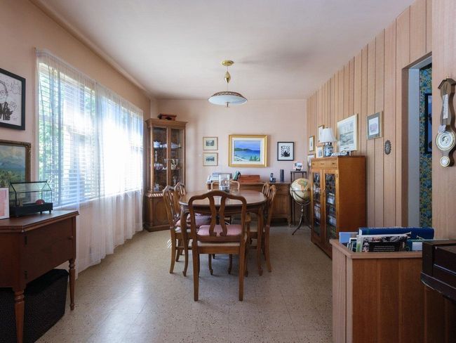 Dining space with light floors | Image 6
