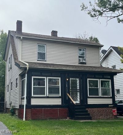 View of property with a front yard and cooling unit | Image 2