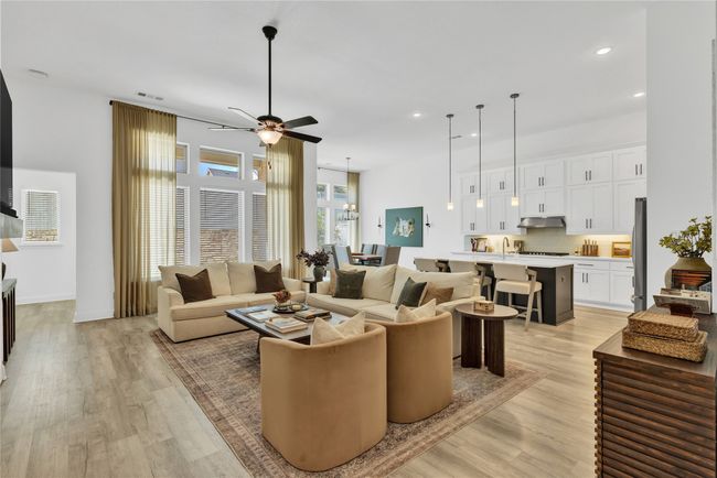 Living area featuring ceiling fan, recessed lighting, light wood finished floors, and baseboards | Image 10