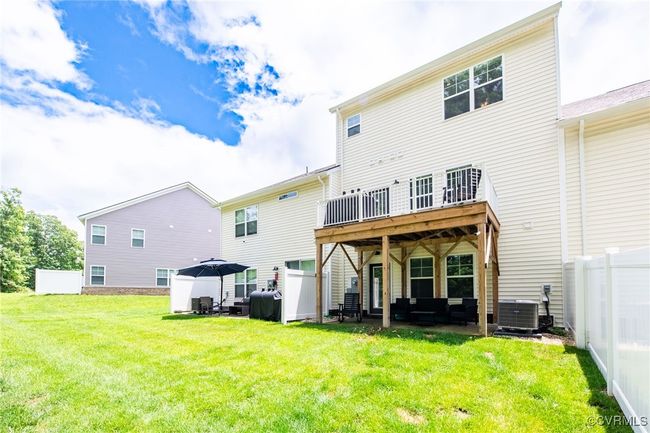 Back of house with a deck | Image 39
