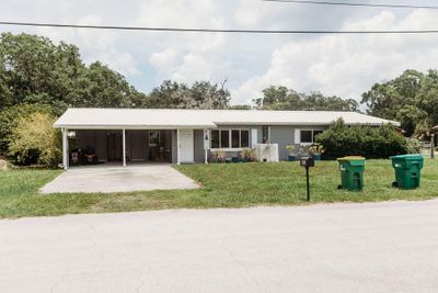 6033 Palm Street, House other with 4 bedrooms, 2 bathrooms and null parking in Mims FL | Image 2