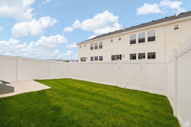 Fenced backyard featuring a gate | Image 35