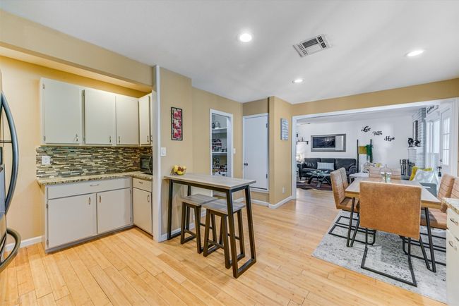 A built-in dry bar and an abundance of cabinetry offer storage and convenience you’ll appreciate every day | Image 7