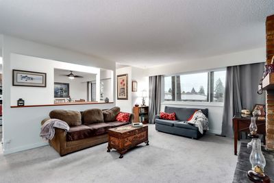 1951 Austin Ave, Home with 4 bedrooms, 2 bathrooms and 3 parking in Coquitlam BC | Image 3