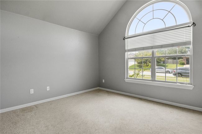 Second bedroom with large window for natural light | Image 10