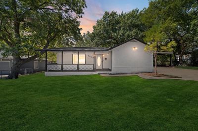 View of front facade with a lawn | Image 1