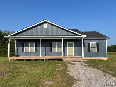 View of front of house featuring a front lawn | Image 1