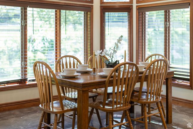 Dining space featuring baseboards | Image 12