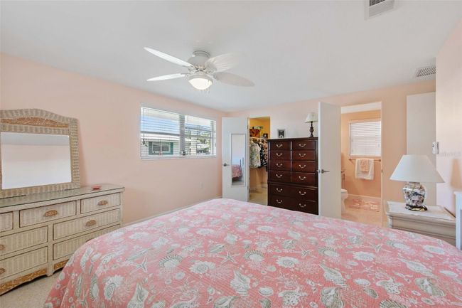 Your primary bedroom has a walk-in closet and ensuite bathroom. | Image 16