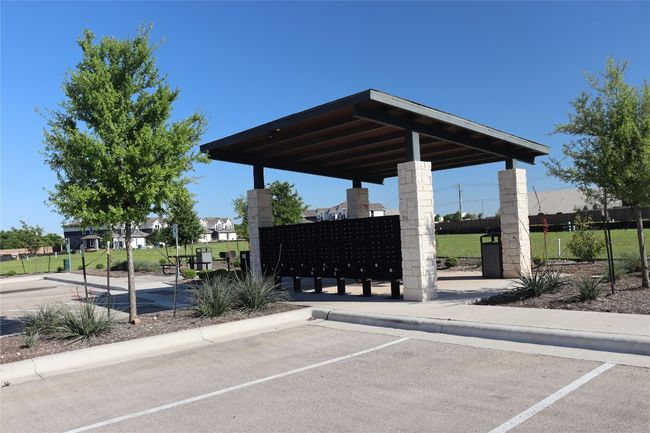 View of property's community with mail area and uncovered parking | Image 9
