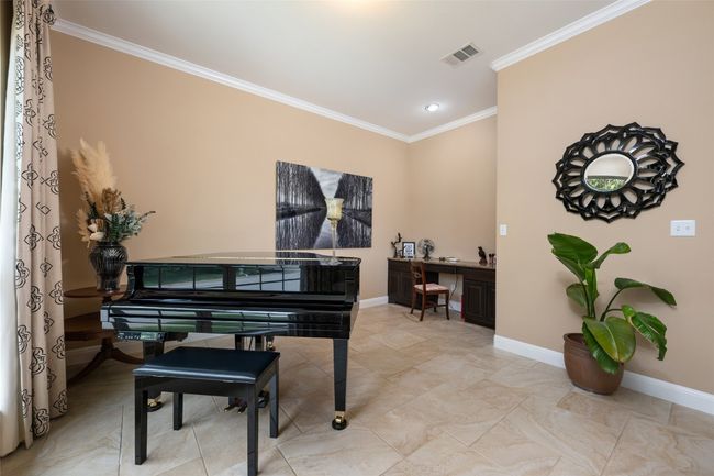 Living area with ornamental molding and baseboards | Image 4