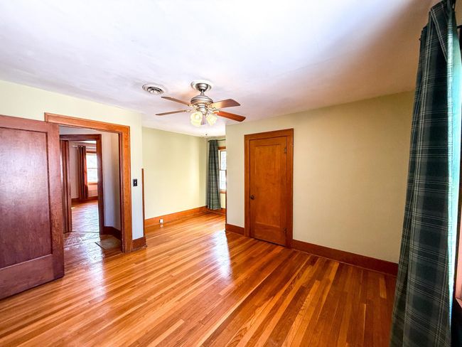 Primary bedroom offers plenty of natural light throughout | Image 19