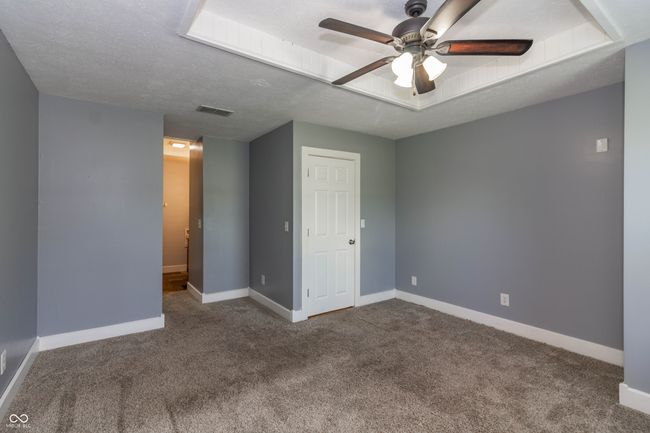 14 x 12 Primary Bedroom with walk in closet and private full bathroom. | Image 9