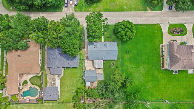 Aerial perspective showcasing the included additional lot—offering expanded outdoor space, added privacy, or future build potential. | Image 28