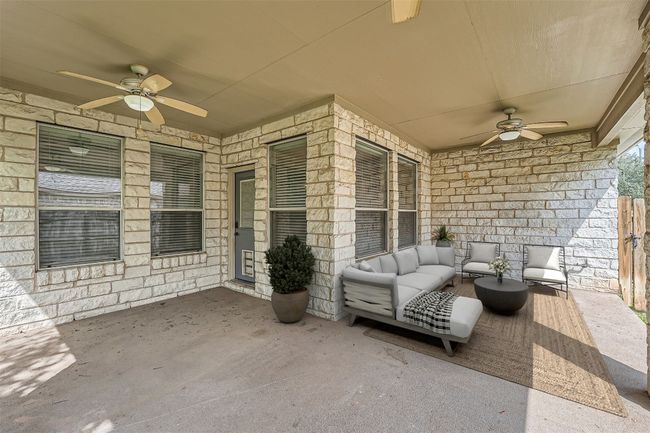 View of patio / terrace with ceiling fan and outdoor lounge area | Image 37